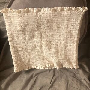 Ruffled Cream Smocked Top expand, expand a band binder